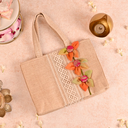 Jute Hamper Bag with Multicolor Handcrafted Flowers and 4 Tissue Potlis
