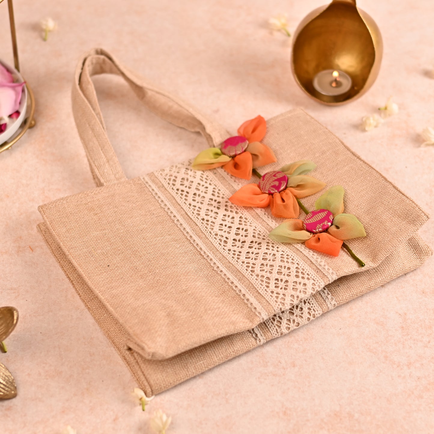 Jute Hamper Bag with Multicolor Handcrafted Flowers and 4 Tissue Potlis