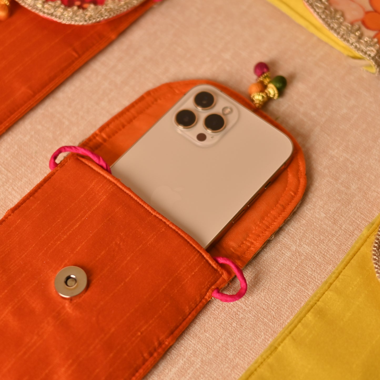 Handcrafted Mobile Sling Bag for Wedding Functions