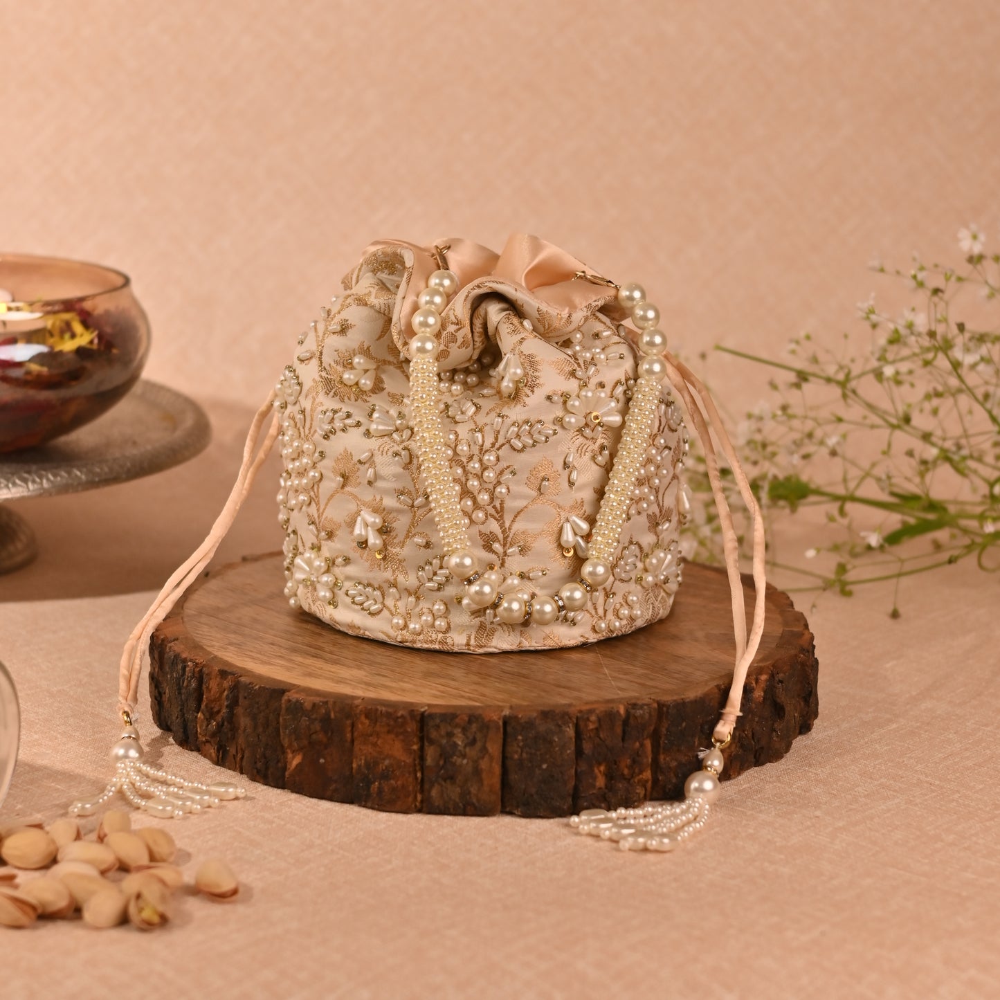 Banaavat Essence Off White Silk Brocade Potli – Pearl Embellished with Circular Base