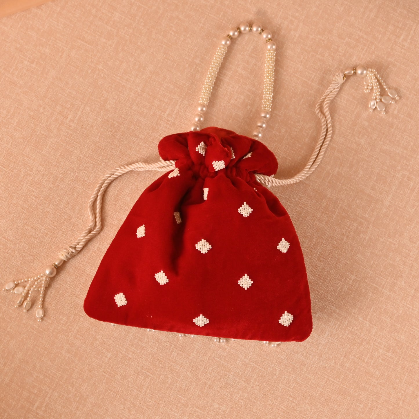 Banaavat Essence Red Velvet Potli – Pearl Barfi Detailing & Pearl Handle